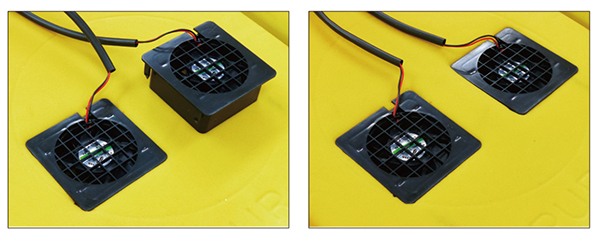 穴に送風ファンを取り付ける。